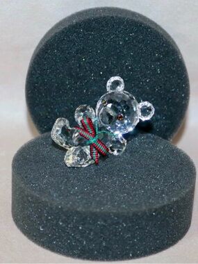 Swarovski Crystal Kris Bear with Red and Green Ribbon Reclining
